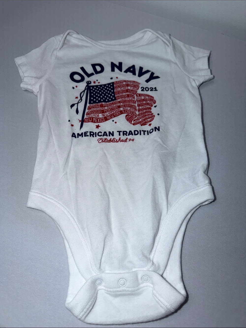Old Navy White Baby One-Piece with Red and Navy Flag Graphic